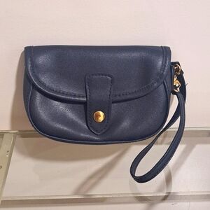 Navy Blue Wristlet Clutch With Gold Accents.